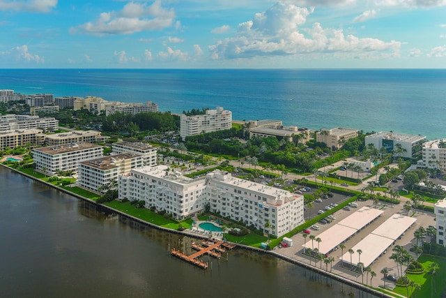 birds eye view of property featuring a water view