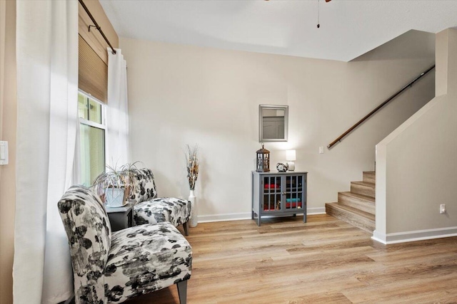 sitting room featuring light hardwood / wood-style floors