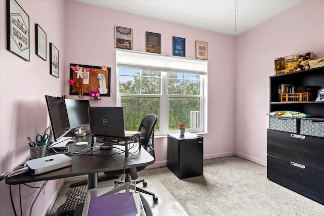 office area with carpet floors and a healthy amount of sunlight