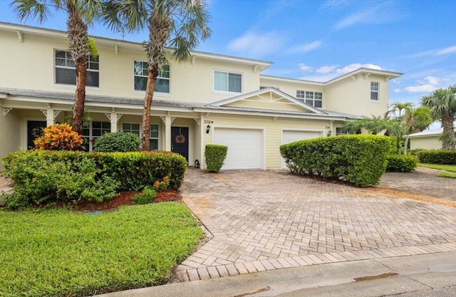 view of front of property with a garage