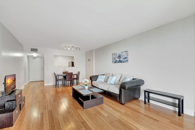 living room with wood-type flooring