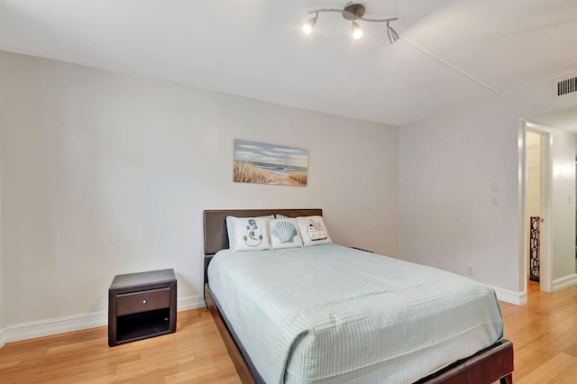 bedroom featuring light hardwood / wood-style flooring