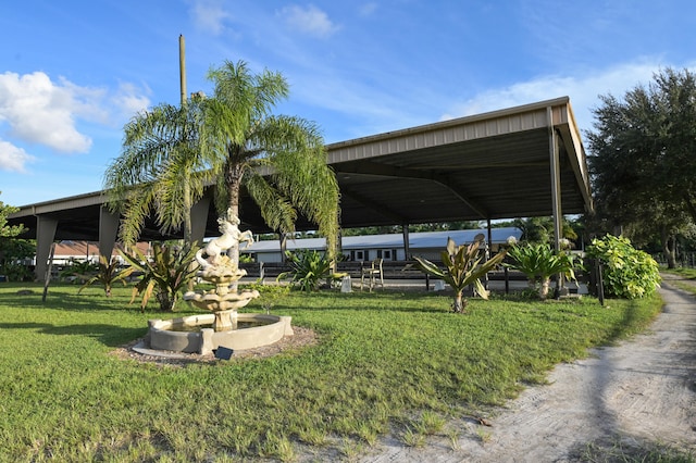 view of yard featuring a carport