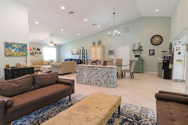 living room with light tile patterned flooring, ceiling fan with notable chandelier, and high vaulted ceiling