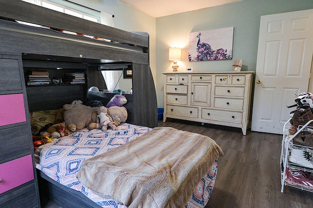 bedroom featuring dark hardwood / wood-style floors