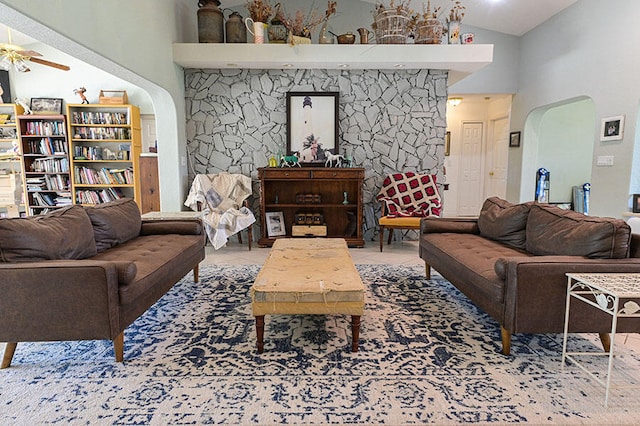 living room featuring high vaulted ceiling