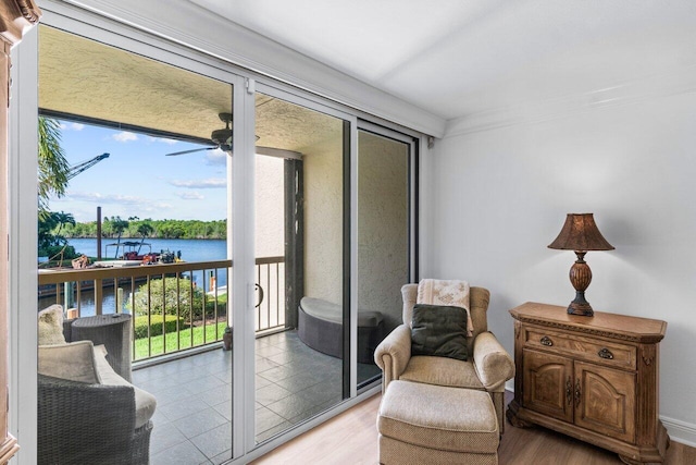 balcony featuring a water view