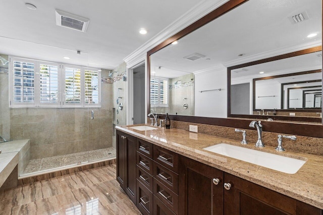 bathroom featuring vanity, crown molding, a notable chandelier, and a shower with shower door