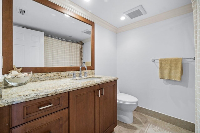 bathroom with toilet, walk in shower, and vanity