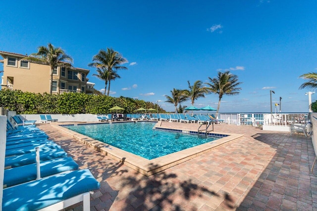 view of pool featuring a patio