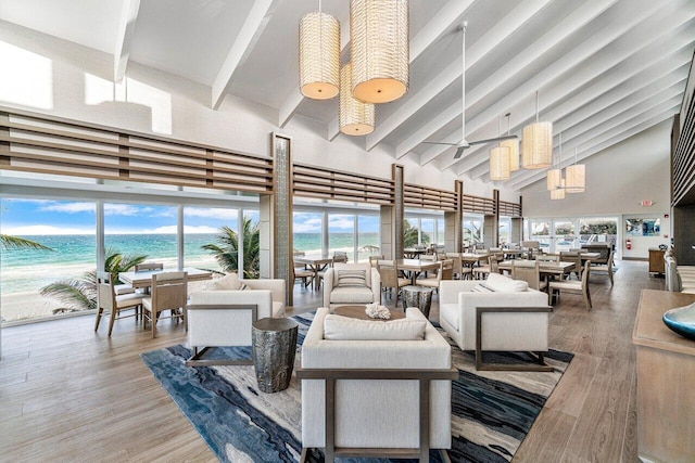 lobby with a water view and a view of the beach