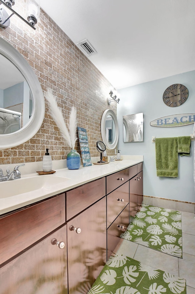 bathroom featuring vanity and tile patterned flooring