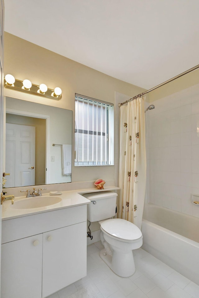 full bathroom with tile patterned flooring, shower / tub combo, vanity, and toilet