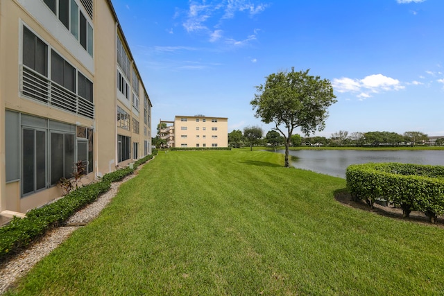 view of yard with a water view