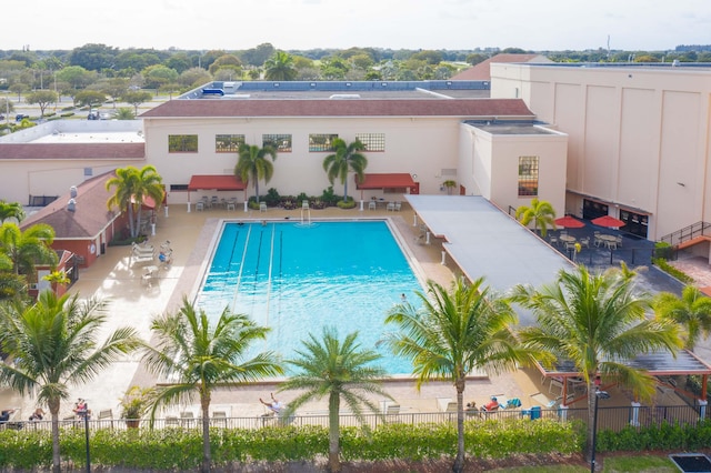 view of swimming pool featuring a patio area