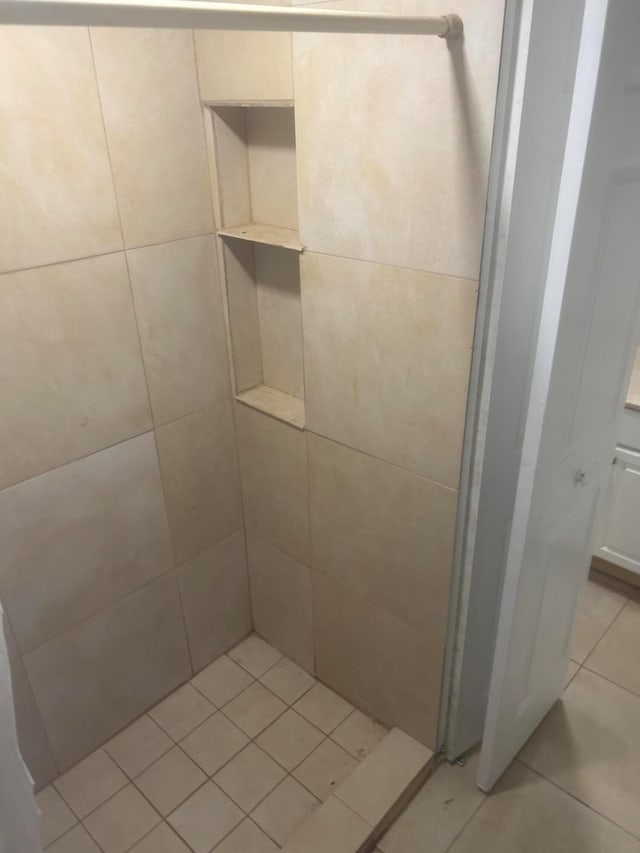 bathroom with tile patterned floors