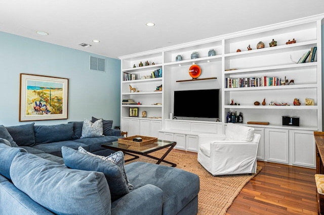 living room featuring dark wood-type flooring