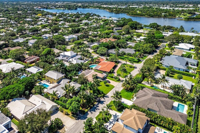 birds eye view of property featuring a water view