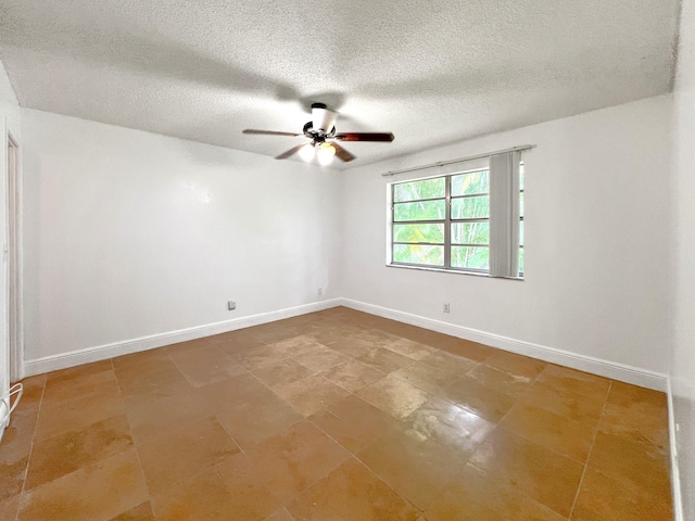 unfurnished room with a textured ceiling and ceiling fan