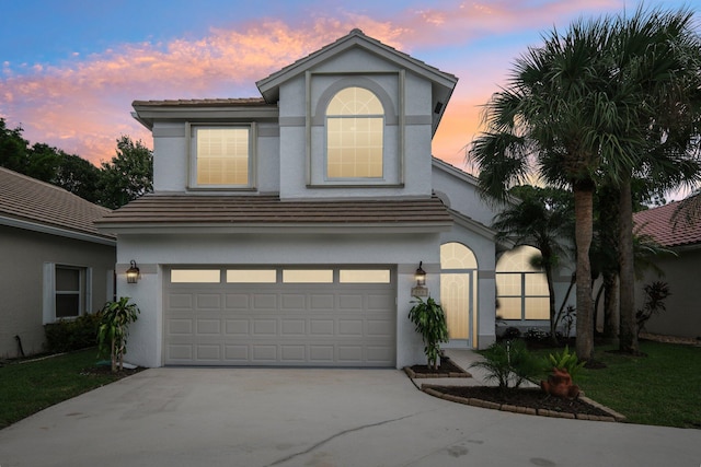 view of front of property with a garage