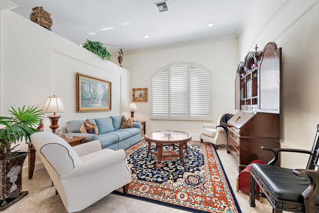 tiled living room with crown molding