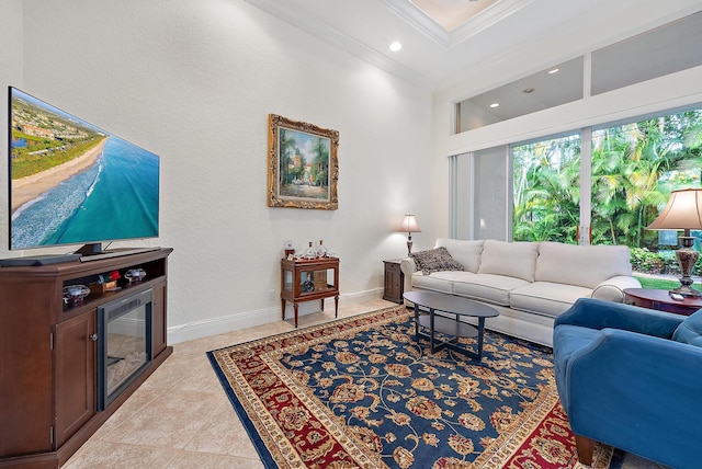 living room featuring light tile patterned floors and crown molding