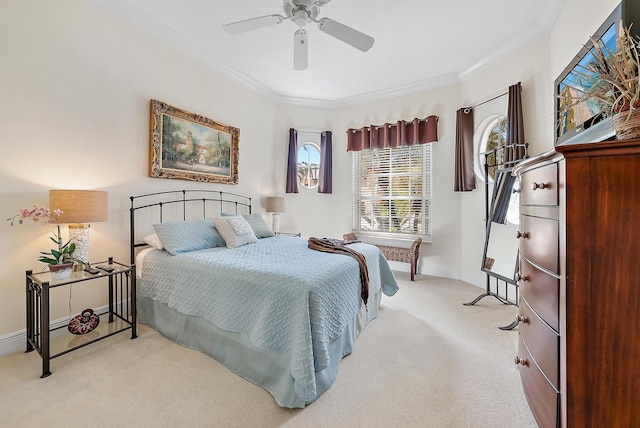 bedroom featuring ceiling fan, light carpet, and ornamental molding