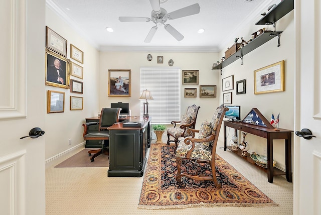 home office featuring ceiling fan, light colored carpet, and crown molding