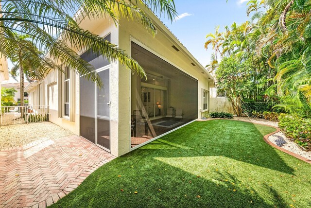 exterior space featuring a yard and a patio area