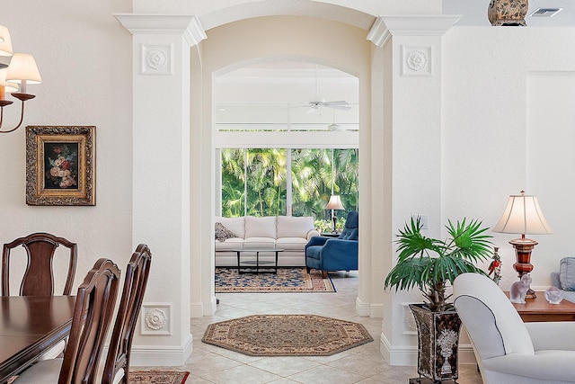 interior space featuring ceiling fan and light tile patterned flooring