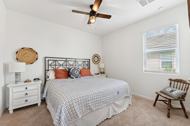 bedroom with ceiling fan and light colored carpet