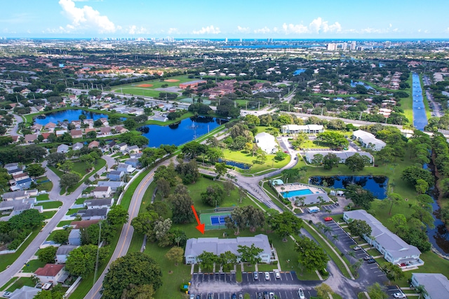 birds eye view of property featuring a water view