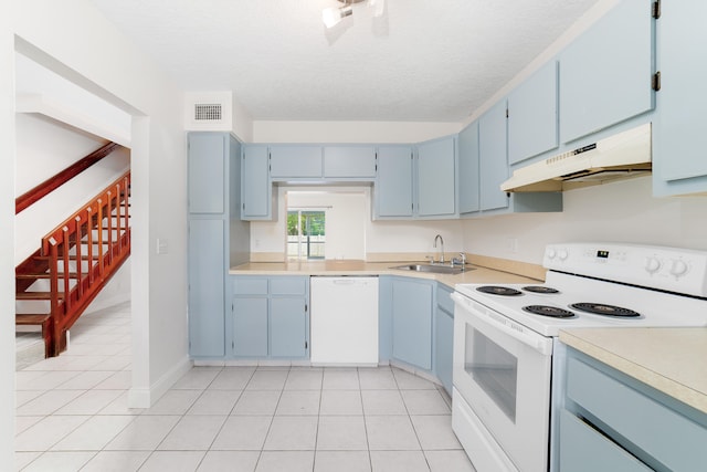 kitchen featuring light tile patterned flooring, white appliances, ventilation hood, a textured ceiling, and sink