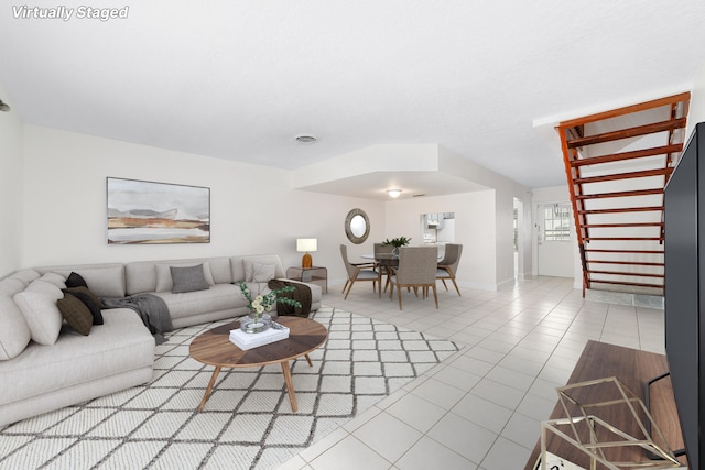 living room featuring tile patterned floors