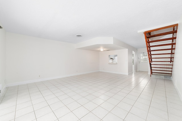 interior space featuring light tile patterned floors