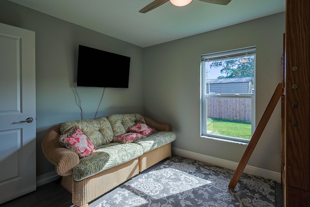 sitting room featuring ceiling fan