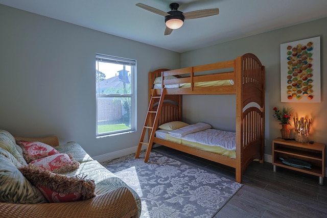 bedroom featuring dark hardwood / wood-style floors and ceiling fan