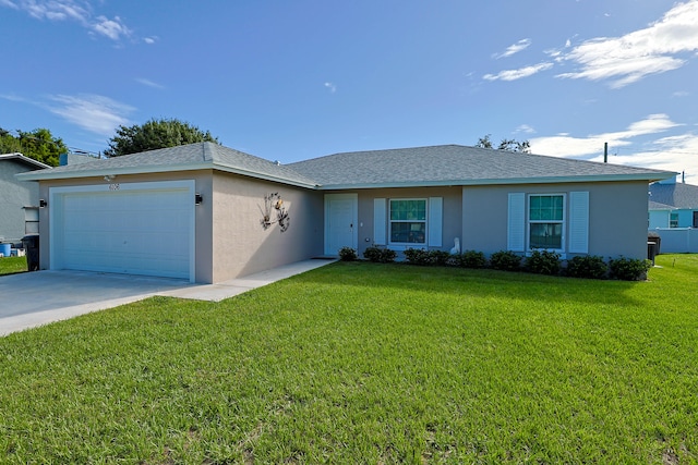 ranch-style home with a front lawn and a garage