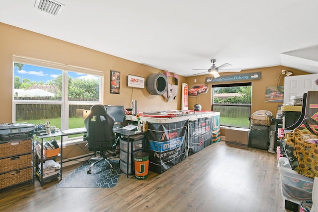 interior space featuring ceiling fan and dark hardwood / wood-style flooring