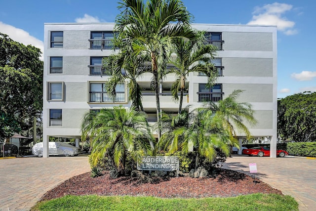 view of building exterior with a carport