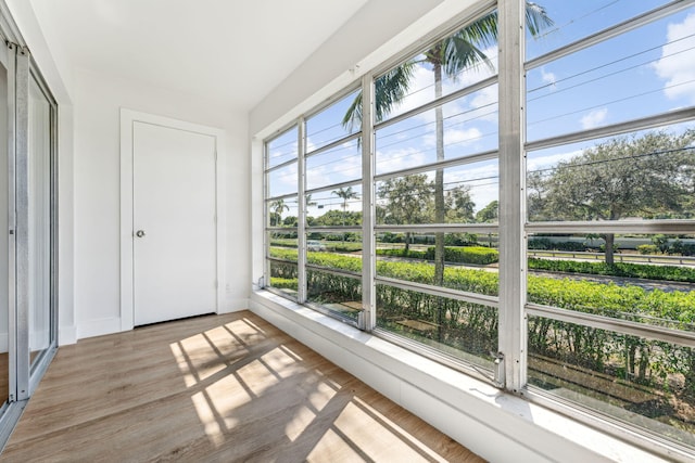 unfurnished sunroom featuring plenty of natural light