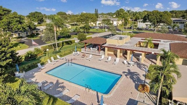 view of swimming pool featuring a patio area