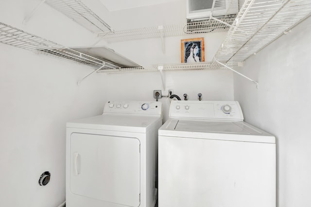 laundry room with washer and clothes dryer