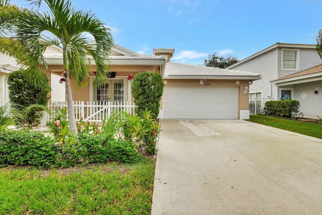 view of front of property featuring a garage