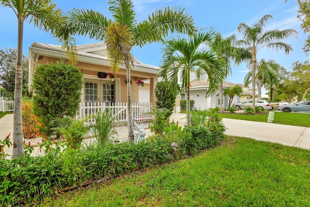 view of front of home with a front lawn and covered porch