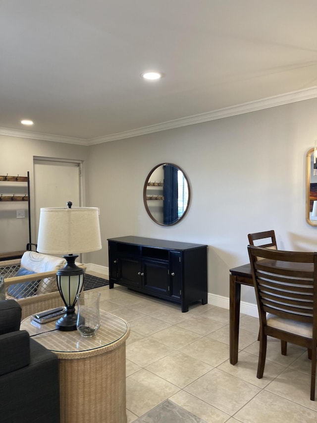 living area with baseboards, ornamental molding, recessed lighting, and light tile patterned flooring