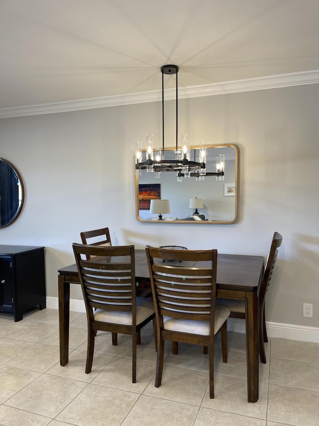 dining space with crown molding, baseboards, light tile patterned flooring, and a notable chandelier