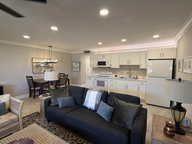 living area featuring crown molding, baseboards, recessed lighting, and visible vents