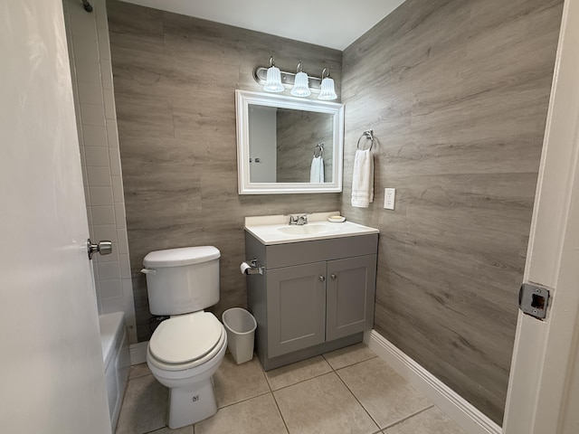 full bath with tile patterned flooring, baseboards, toilet, and vanity