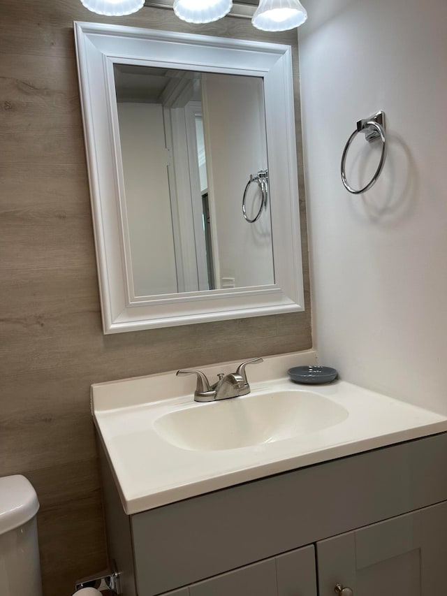 bathroom with vanity and toilet